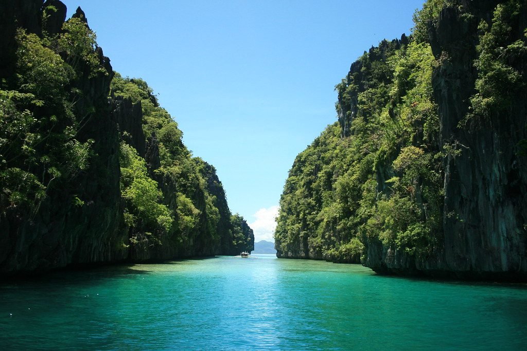 Turquoise water between the limestone cliffs of the Big Lagoon at El Nido, Palawan, Philippines