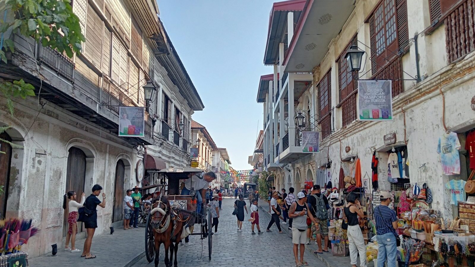 Horse-drawn kalesa on the cobbled Calle Crisologo lined with heritage houses in Vigan, Ilocos Sur, Philippines
