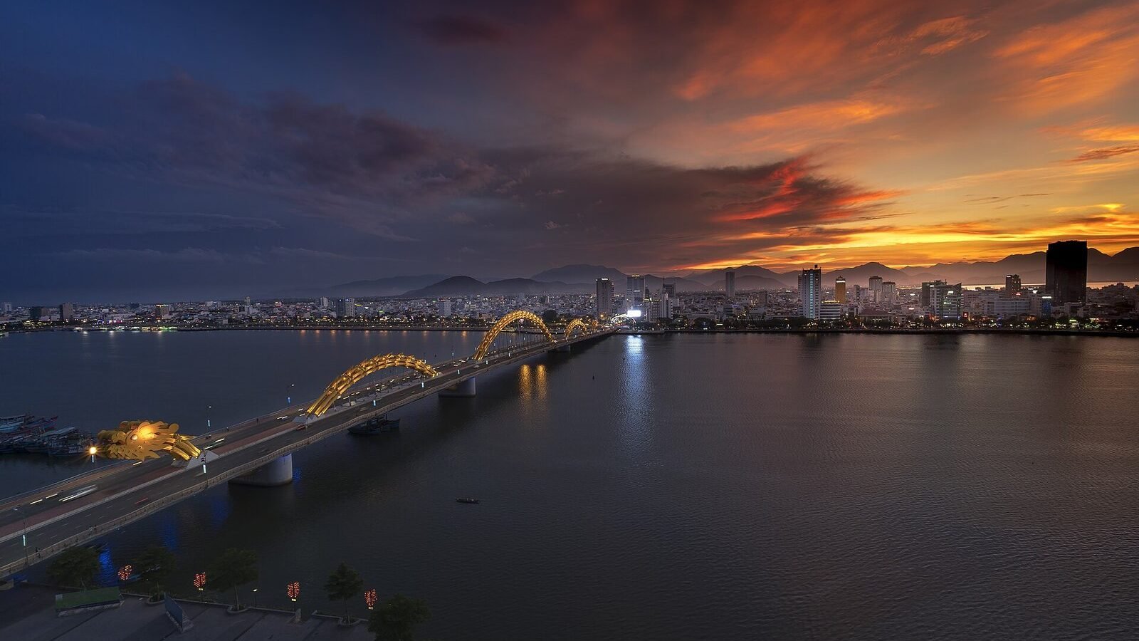 The Dragon Bridge spanning the Han River at sunset in Da Nang, Vietnam