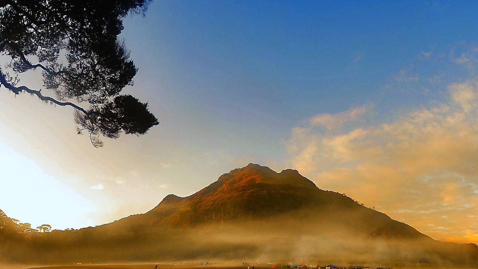 The peak of Mount Apo at sunrise above the mist in Davao, Mindanao, Philippines